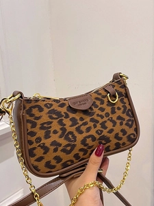 Vintage leopard print underarm bag with gold chain and brown leather strap for women