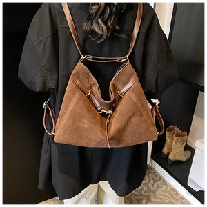Brown frosted large backpack showing shoulder strap detail and vintage bohemian style