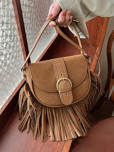 Vintage brown suede saddle bag with fringe tassel and metallic buckle for women