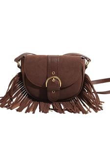 Vintage brown tassel saddle crossbody bag with bohemian fringe and gold horseshoe buckle