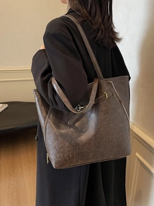 Vintage large capacity dark brown leather tote bag for women showing back view and texture