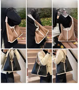Modella che indossa borse hobo in pelle nera e marrone con finiture in peluche autunnale