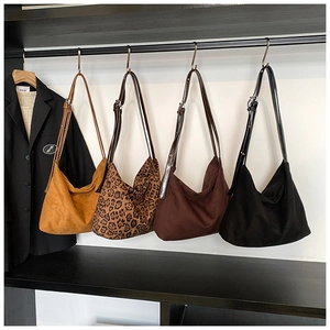 Selection of matte PU hobo tote bags in camel, leopard, brown and black with adjustable straps