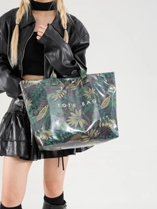Large tropical leaf print tote bag with white TOTE BAG text and sturdy top handles