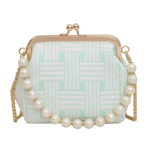 Green jacquard frame bag with pearl handle and golden chain strap for women