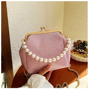 Pink glitter tweed handbag with pearl handle and golden vintage metal clasp detail