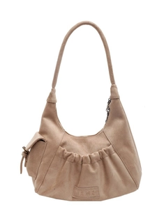 Minimalist beige suede crescent tote bag with pleated detail and small side flap pocket