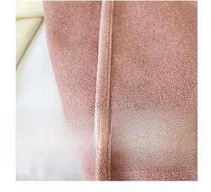 Macro detail of high-quality sewing stitches on pink suede plush tote bag fabric