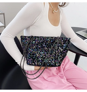 Detailed shot of rainbow black sequin shoulder bag with gunmetal chain strap