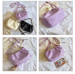Close-up of pleated dumpling bag detailing various colors and textured leather finish