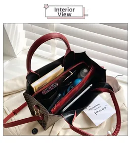 Internal view of the large capacity tote bag showing multiple storage compartments