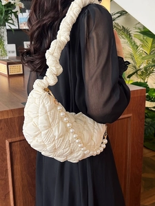 Quilted cloud bag in off-white with faux pearl chain and pleated shoulder strap