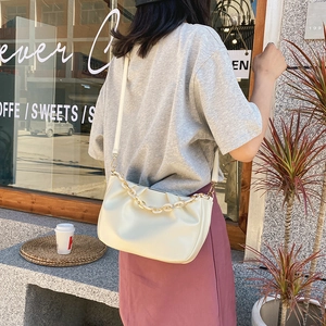 Chic beige pleated cloud bag with thick chain strap for women, stylish crossbody bag fashion