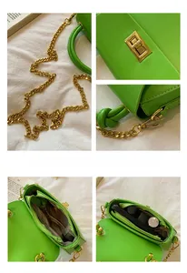 Detail view of green leather bag interior compartments and premium gold chain strap