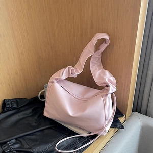 Pink pleated baguette shoulder bag with wide ruched strap and minimalist cloud design