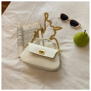 Chic white glossy leather flap handbag with gold metal twist lock and chain strap details
