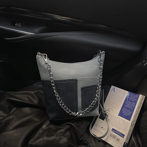 Fashionable denim patchwork shoulder bucket bag with silver metal chain straps