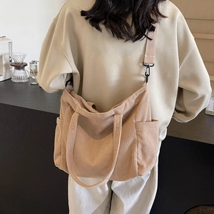 Minimalist corduroy tote bag in khaki with adjustable shoulder strap and large capacity