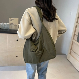 Olive green large nylon tote bag with wide strap for work or college casual style
