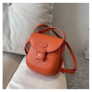 Detail of orange cross-body bag with vertical stripes and Fashion Bags nameplate