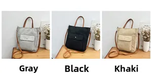 Three-color collection of linen tote bags in gray, black, and khaki with leather handles