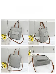 Detailed views of grey canvas tote bag with brown leather straps and front pocket