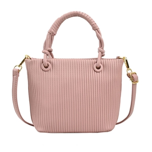 Pink pleated bucket bag with woven handle and adjustable strap for women in 2024 fashion