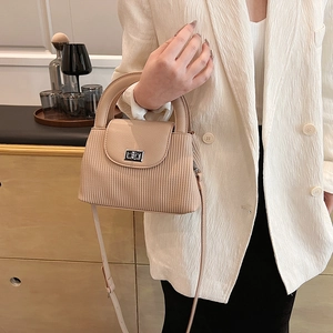 Beige quilted small square bag with silver twist lock and chain strap for women