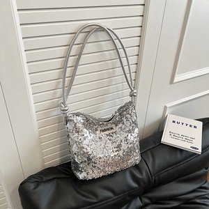 Sparkly silver sequin handbag with chain strap and fashion plate for summer style