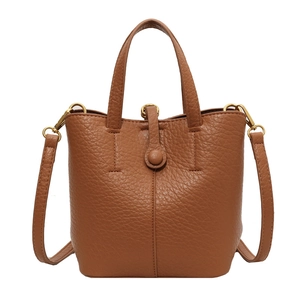 Vintage brown lychee leather bucket bag with top handles and adjustable strap