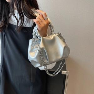 Silver metallic pleated cloud bag with braided handle and chain strap for women