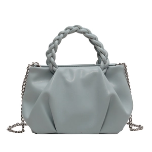 Light blue pleated crossbody bag with woven handle and elegant silver chain strap