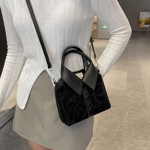 Chic black crossbody bag with shirt collar design and unique marble texture velvet