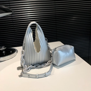 Detail view of silver pleated handbag set with chunky chain and matching zipper pouch