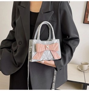 Chic silver square handbag with pink leather bow and heart rhinestone detail