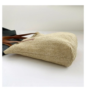 Détail du tissage en V et de la base renforcée du sac seau en paille de grande capacité