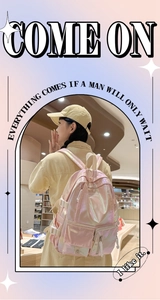 Detail of pink holographic backpack featuring glossy fabric and white adjustable straps