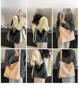 Detailed views of vintage bucket bag with elegant white lace ribbons in black and pink