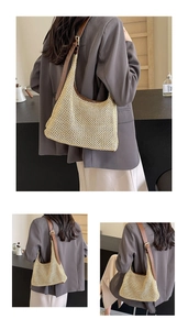 Detailed close-up of woven hobo bag with brown leather strap and intricate hollow mesh texture