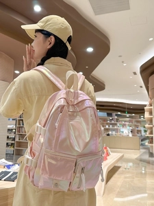 Pink holographic backpack for women with multi-pocket system and shimmering laser finish
