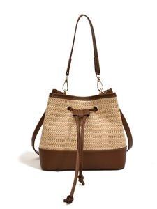Sac seau en paille tissée avec garniture en cuir marron et cordon pour un look d'été vintage