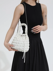 White quilted cloud bucket bag with silver chain strap and stylish drawstring closure