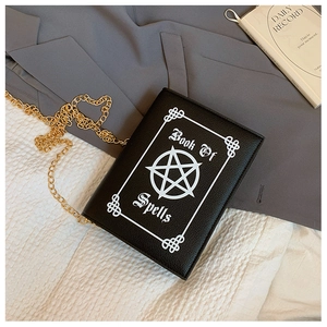 Gothic Book of Spells crossbody bag with pentagram and gold chain strap detail