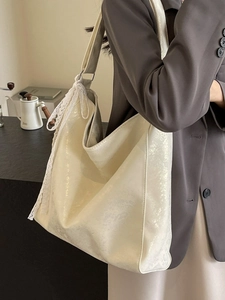 Minimalist ivory pearlescent bucket bag with elegant white lace strap decoration