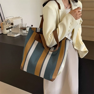Large striped canvas tote bag in navy, brown and beige for women's daily commute style