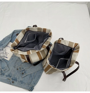 Top view of large striped canvas tote bag showing inner pocket and spacious interior