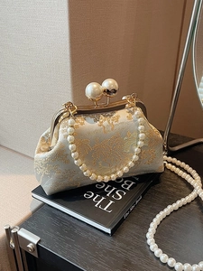 Elegant ivory qipao evening bag with gold floral jacquard and pearl strap handle
