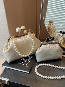 Elegant Chinese embroidery evening bag set with pearl handles and golden metal clasps