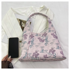 Detailed embroidery of pine and crane pattern on this light pink chic underarm bag