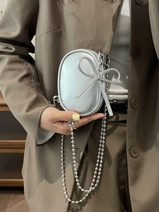 Mini bolso bandolera plateado con lazo y cadena metálica para mujer estilo coreano